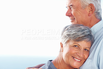 Buy stock photo Portrait of smiling mature woman leaning head against man's chest