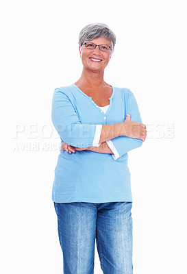 Buy stock photo Casually dressed mature woman smiling over white background with hands folded