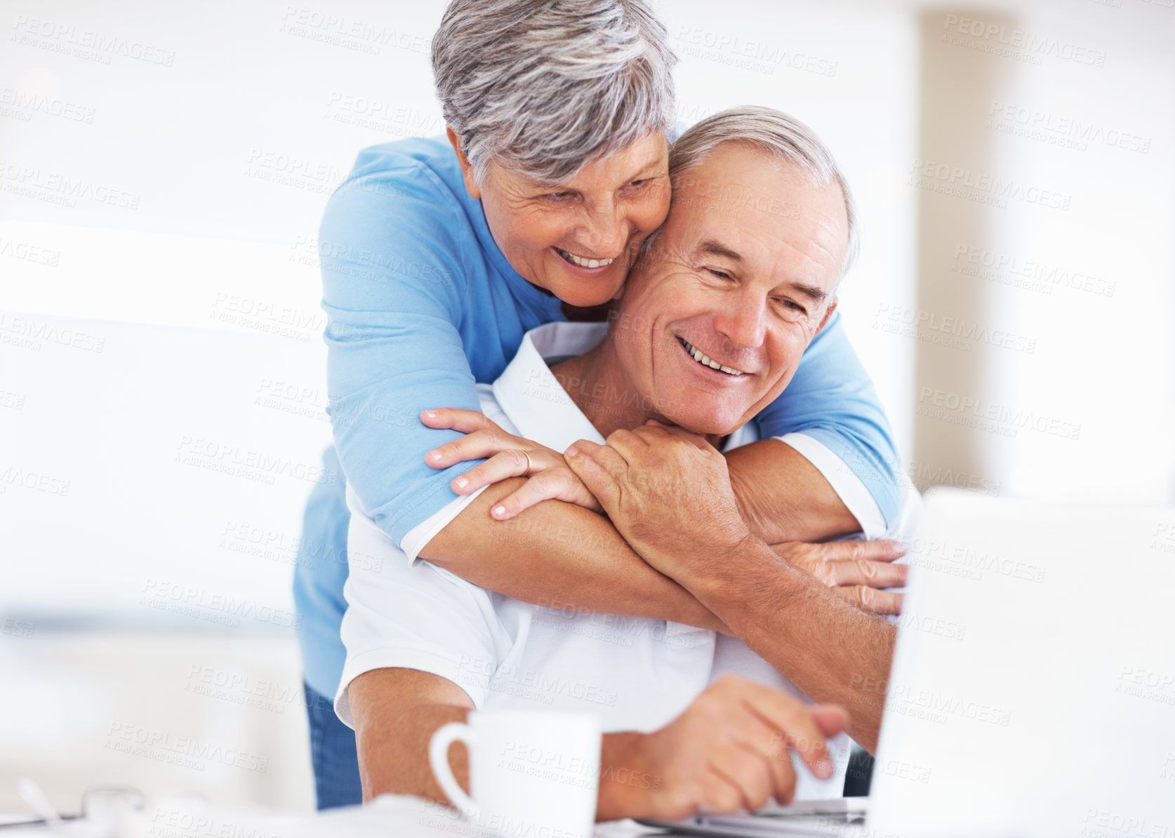 Buy stock photo Senior couple, laptop and hug in home with reading for finance, review and excited with profit in morning. Elderly man, woman and happy with notification, success and growth for retirement income