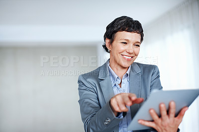 Buy stock photo Business, smile and tablet with mature woman in office for online research or professional management. Corporate, executive and smile with confident employee person in workplace for administration