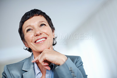 Buy stock photo Face, smile and thinking with mature woman in office for problem solving or professional management career. Future, idea and vision with confident employee person in workplace for corporate planning