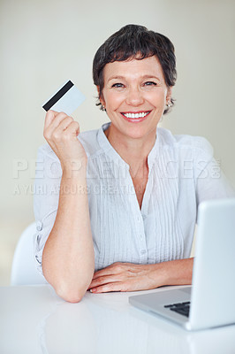 Buy stock photo Office, portrait and businesswoman with laptop for credit card, online banking and financial score success. Mature person, shopping and happy with debit for transaction, digital payment or connection