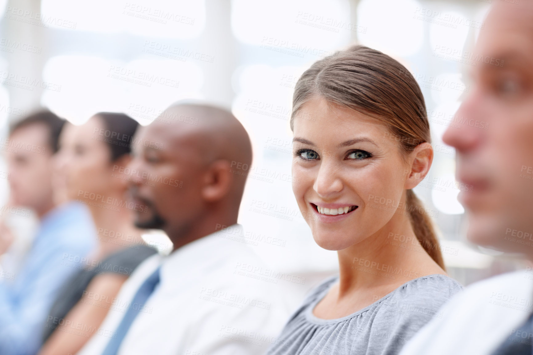 Buy stock photo Portrait, smile and businesswoman in audience for seminar, workshop or learning at conference. Employees, happy or proud intern in presentation for staff training, development or convention in office