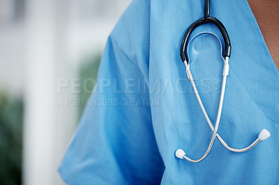Buy stock photo Cropped image of a stethoscope hanging over a doctor's shoulder