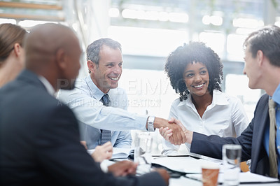 Buy stock photo Happy, business people and meeting with handshake for teamwork, collaboration or deal at office. Businessman, colleagues or employees shaking hands for contract agreement, b2b or mission at workplace