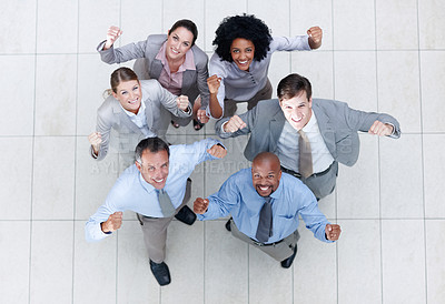 Buy stock photo Top view of a successful business team looking up at you - Copyspace