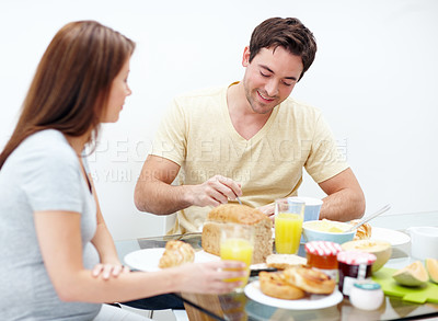 Buy stock photo Pregnant woman, eating or happy couple in home with breakfast for healthy diet or nutrition. Food, wellness or people enjoying meal with pregnancy, smile or prenatal health in morning at family house