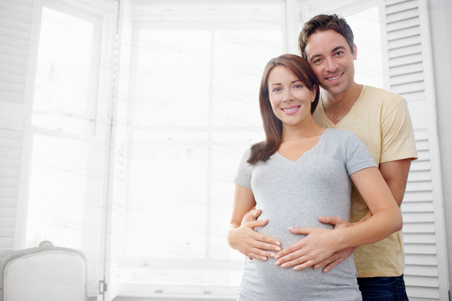 Buy stock photo Pregnancy, happy couple and portrait in home for marriage, maternity leave or responsibility in house. Nurture, expecting and people with smile or support for motherhood, love or healthy relationship