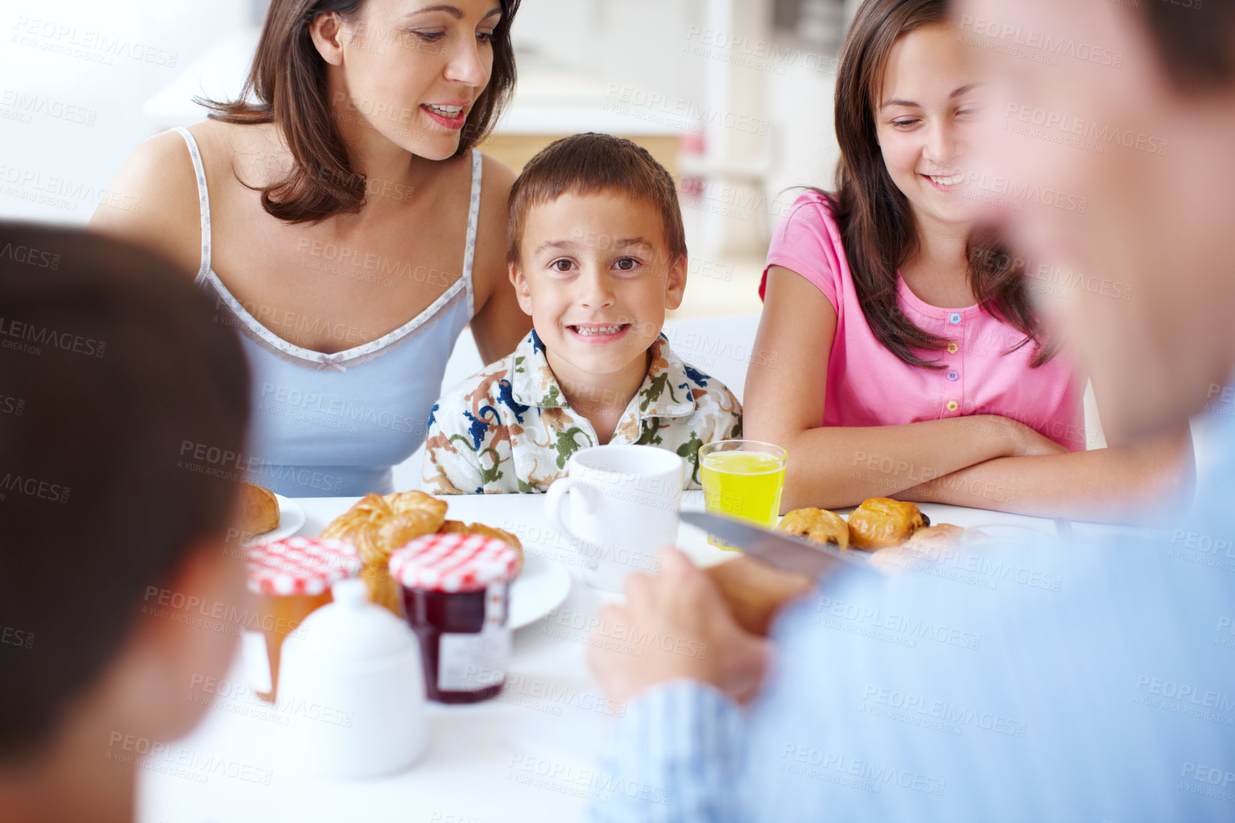 Buy stock photo Family, portrait and morning breakfast in home, dining table and support with eating healthy food. Parents, children and talking together in kitchen with meal, love and brunch nutrition for bonding