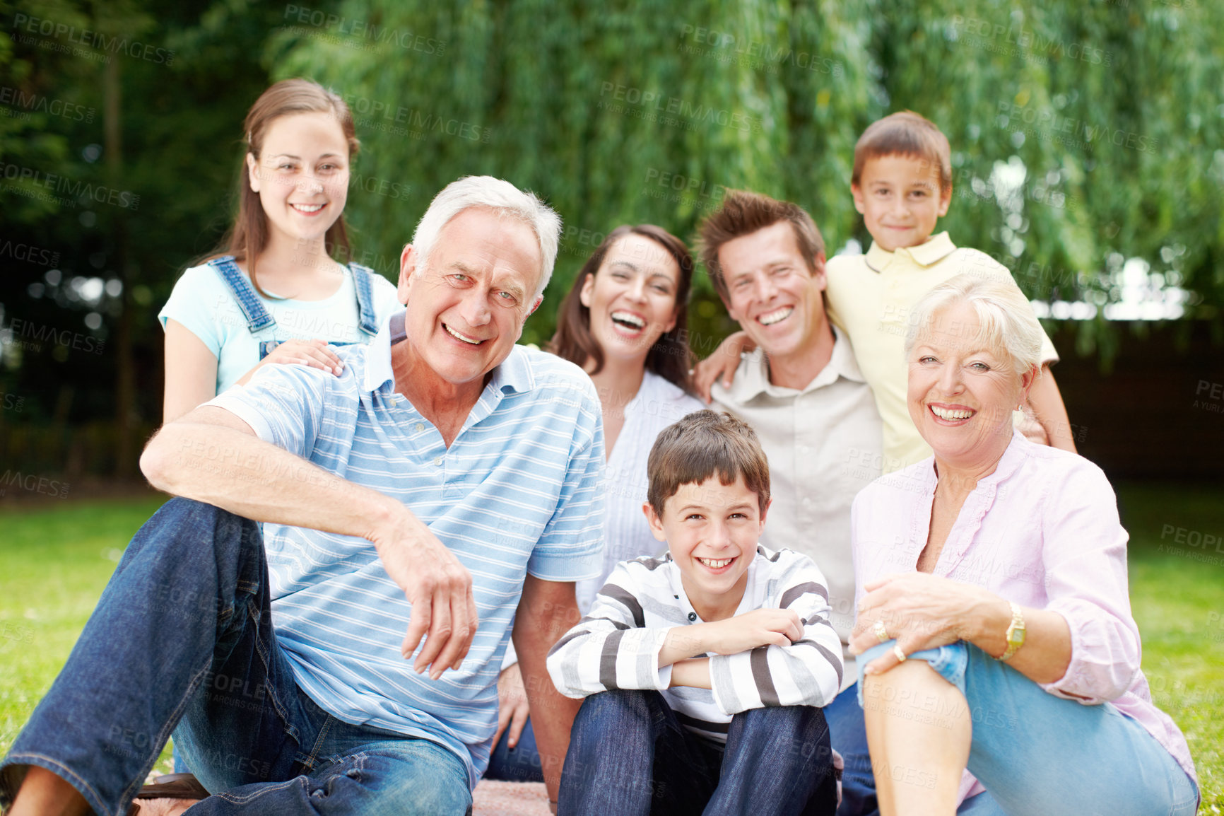 Buy stock photo Happy, portrait and big family with kids in nature for holiday, weekend or bonding together. Grandparents, parents and children with smile, joy or generations for picnic or outdoor vacation at park