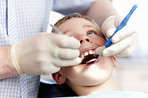 Boy getting his teeth checked