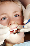 Little boy getting his dental treatment