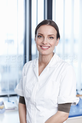 Buy stock photo Portrait of beautiful young dentist smiling in office