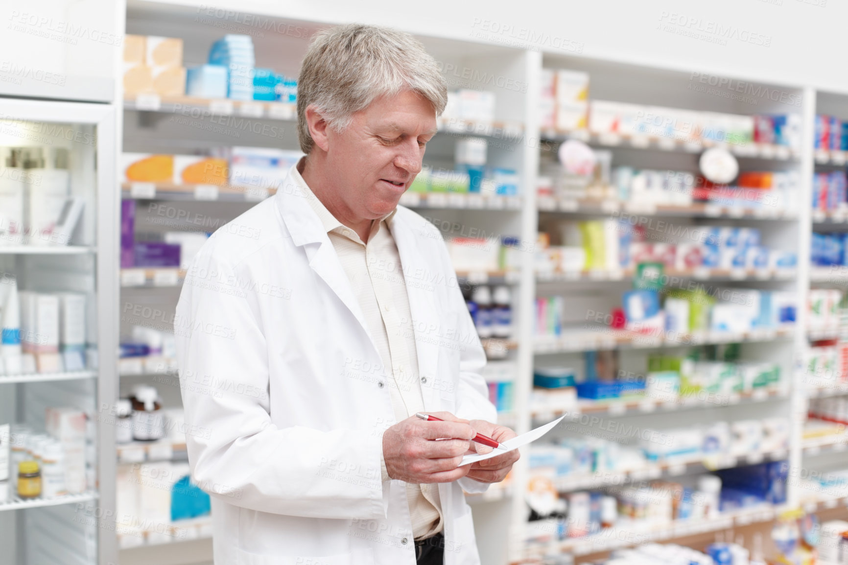 Buy stock photo Man, reading and pharmacist with medical prescription at dispensary for medication, supplements or pills. Chemist, inventory and male apothecary with stock list for medicine or tablets in drug store.