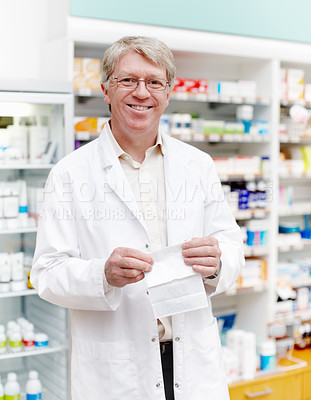 Buy stock photo Happy, portrait and pharmacist with prescription at dispensary for medication, supplements or pills. Mature chemist, inventory and male apothecary with stock list for medicine in drug store. 