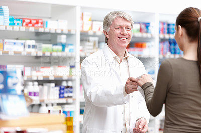 Buy stock photo Pharmacist, customer and smile for wellness, help and medicine in drugstore, chemist or pharmacy. Medical professional, male person and sales for prescription or info in dispensary as advice or care