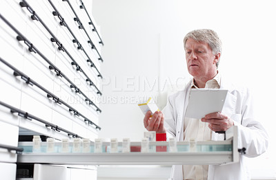 Buy stock photo Pharmacist, inventory and checklist as stock, pills or medicine in drugstore, chemist or service. Medical professional, male person and pharmacy as prescription, dispensary or info for advice or care