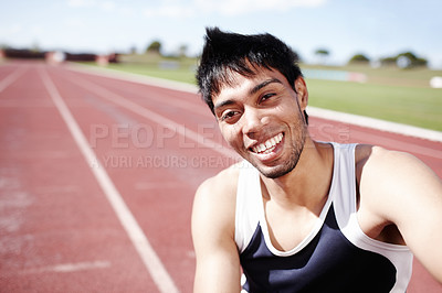 Buy stock photo Portrait of a smiling young sportsman