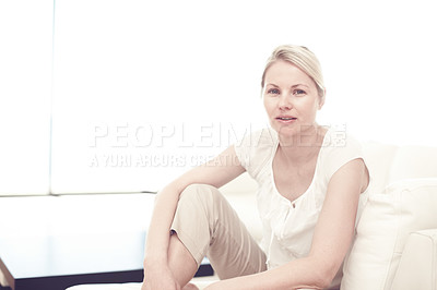 Buy stock photo Casual blonde woman sitting at home