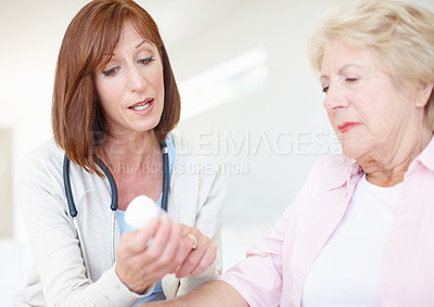 Buy stock photo Woman, doctor or patient with medication for elderly care, consultation or side effects at clinic. Healthcare, worker or employee talking to senior person with a disability for dosage or prescription