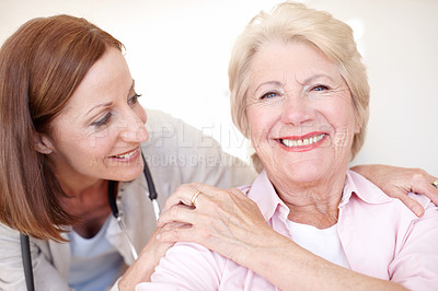 Buy stock photo Consulting, trust and support with old woman and caregiver for rehabilitation, healthcare and volunteer. Medical, retirement home and smile with senior patient and nurse for elderly care monitor