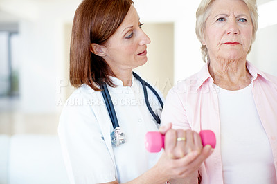 Buy stock photo Physical therapy, doctor and senior woman with weights for rehabilitation, injury treatment and recovery support. Medical, professional and elderly patient with dumbbells in clinic for muscle healing