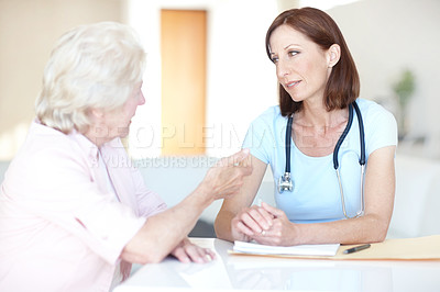 Buy stock photo Discussion, support and doctor with old woman in hospital for consulting, advice and healthcare report. Wellness, feedback and diagnosis with patient and person in clinic for treatment and medical