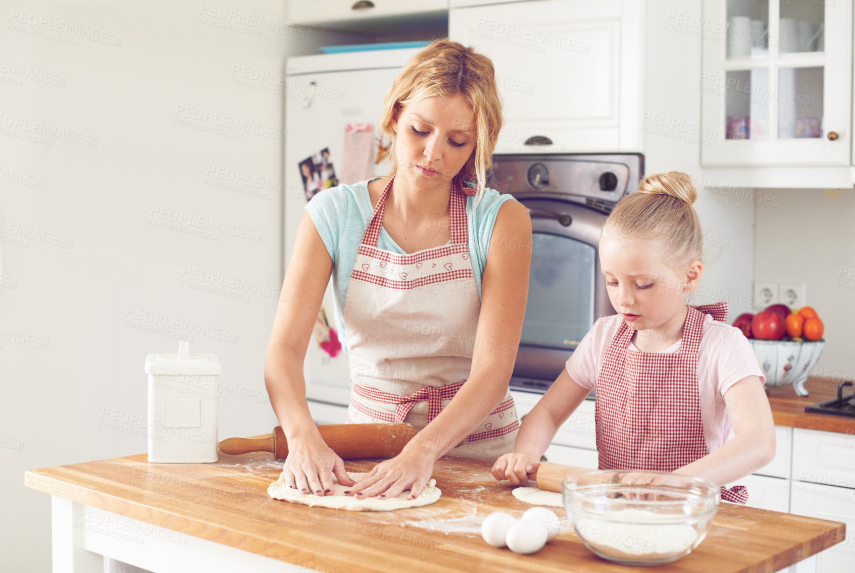 Buy stock photo Mom, girl and dough for dessert in kitchen, preparation and teaching child skill in home. Mother, daughter and love for helping with cookies, cooking food and kid learning to bake cake or pastry