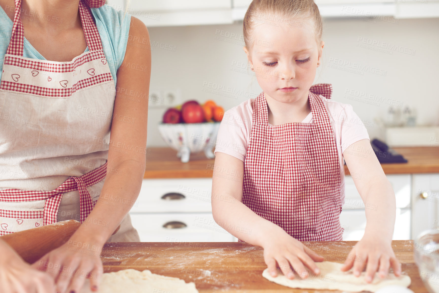 Buy stock photo Mom, girl and hands with dough in kitchen, preparation and teaching child skills in home. Mama, daughter and love for helping with cookies, cooking wheat and kid learning to bake cake or pastry