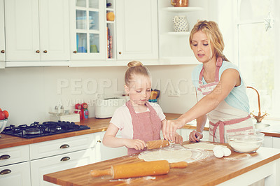 Buy stock photo Kitchen, child and mom with dough for baking, learning and bonding together in help with lunch. Love, mother and daughter with flour, ingredients and cookie recipe in home teaching girl kid baker