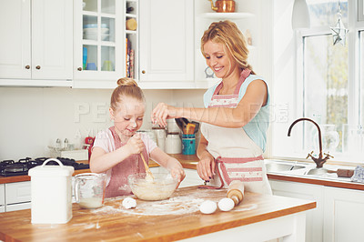 Buy stock photo Baking, child and mom in kitchen together for teaching, learning and happy bonding at lunch. Love, mother and daughter with food, ingredients and help for cookie recipe in home with girl kid baker