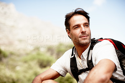 Buy stock photo Thoughtful hiker enjoying a mountain top view