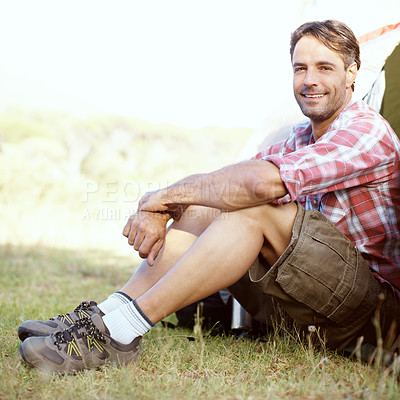 Buy stock photo Outdoor, man and portrait by tent for camping, holiday and travel vacation with confidence in wilderness. Nature, male person and camper with smile for hiking, adventure and campsite in countryside