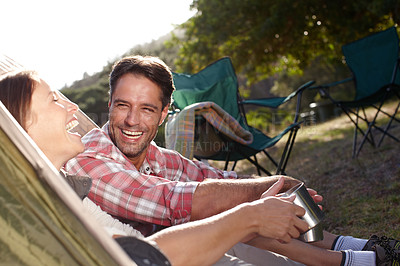 Buy stock photo A happy couple enjoying the outdoors together