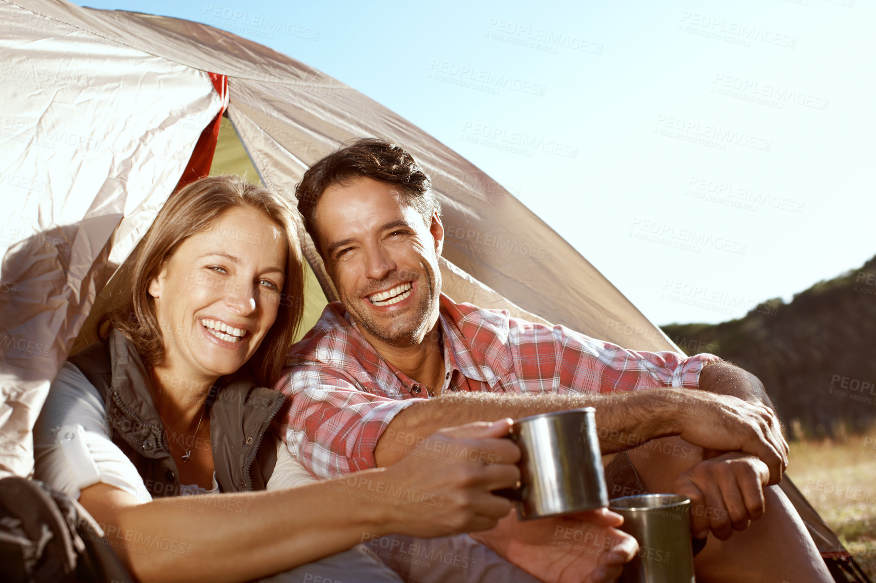 Buy stock photo Portrait of a young couple enjoying the outdoors together