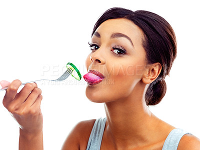 Buy stock photo Portrait, fork and woman with cucumber, nutrition and sustainable eating to lose weight in studio. Vegetable, salad and girl with fresh food for detox diet, vitamins or gut health on white background