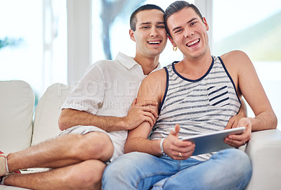 Buy stock photo Gay couple, portrait and tablet on sofa for social media, streaming and online shopping in home. Men, partners and technology in living room for relax, connectivity and latest LGBT news on internet