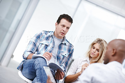 Buy stock photo Team leader, business people or training with book in office for brainstorming startup ideas. Collaboration, manager or group discussion for meeting, creative or coaching on tablet for event planning
