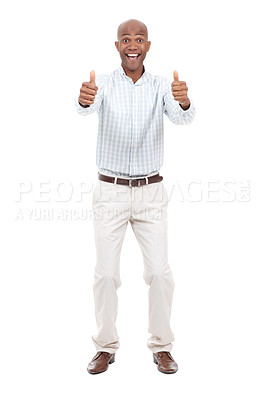Buy stock photo Full length studio portrait of an excited young man giving two thumbs up to the camera and smiling broadly