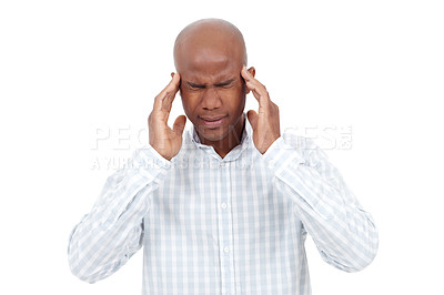Buy stock photo Studio shot of a young african american man holding his temples and wincing in pain