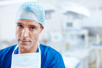 Buy stock photo Close-up of a male doctor who looks confident for the upcoming surgery