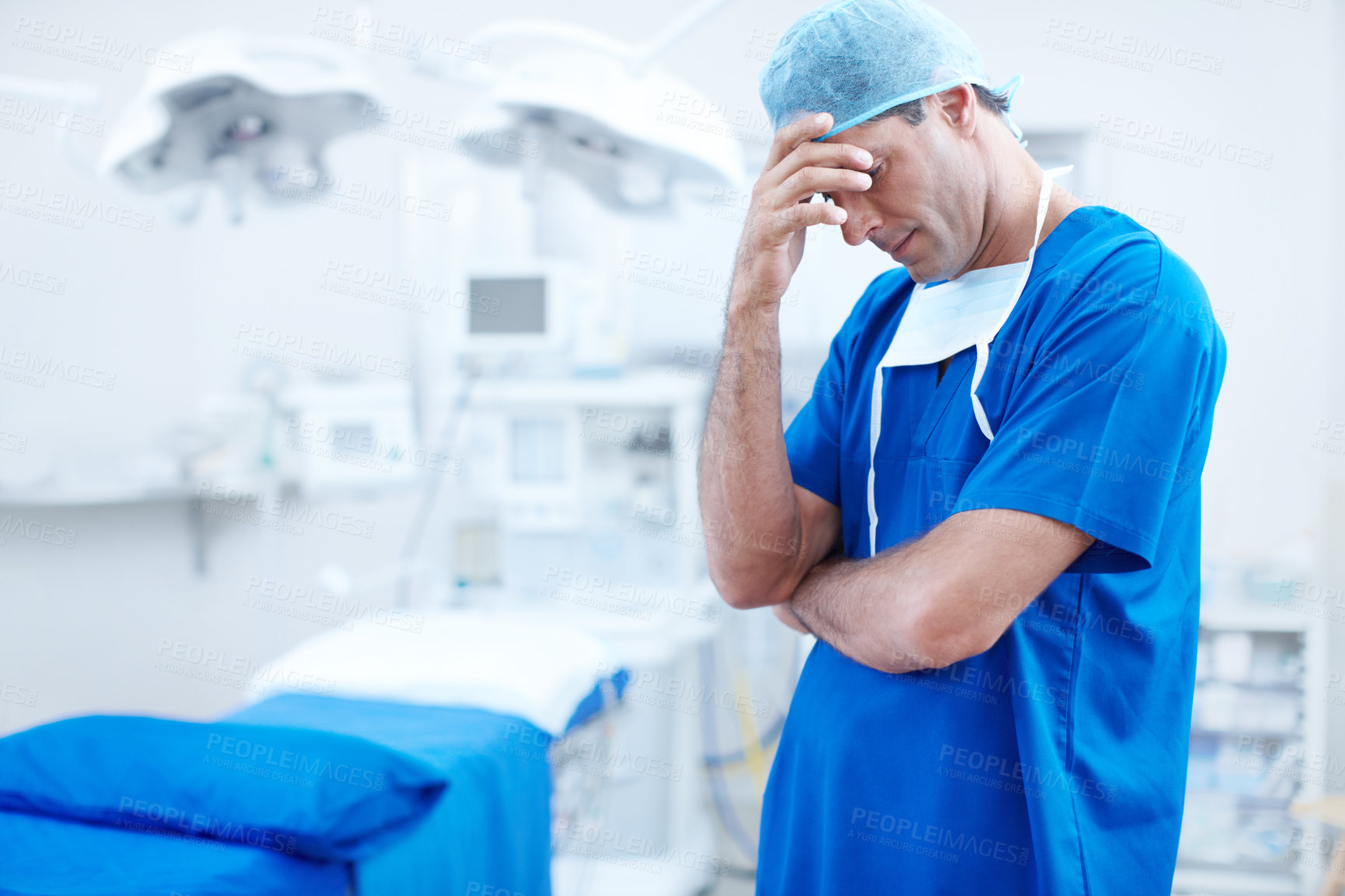 Buy stock photo Sad, surgery and stress with man in hospital for patient loss, healthcare and frustrated. Medical malpractice, burnout and depression with doctor in operating room for theatre, nurse and doubt