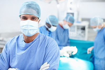 Buy stock photo Theatre, man and doctor in portrait with arms crossed, medical surgery and procedure for teamwork. Hospital, team leader and surgeon with pride for operating room, healthcare and uniform for safety
