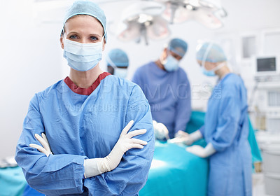 Buy stock photo Confidence, woman and doctor in portrait with theater, medical surgery and procedure for staff. Hospital, team leader and surgeon with arms crossed for operation, healthcare and face mask for safety