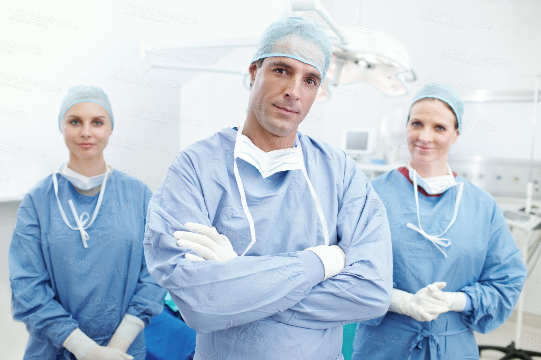 Buy stock photo Doctors, team and confidence in portrait for theater, medical surgery or procedure with pride. Hospital, surgeons and man leader with arms crossed for operating room, clinic or ppe uniform for safety