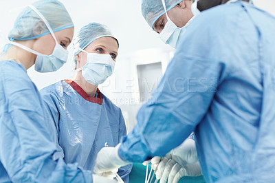 Buy stock photo Surgery, hospital and doctor discussion in operating room for patient, emergency or operation. Healthcare people, collaboration and medical surgeons with surgical tools, teamwork and clinic service