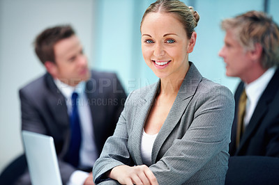 Buy stock photo Portrait of beautiful executive smiling with business people in background