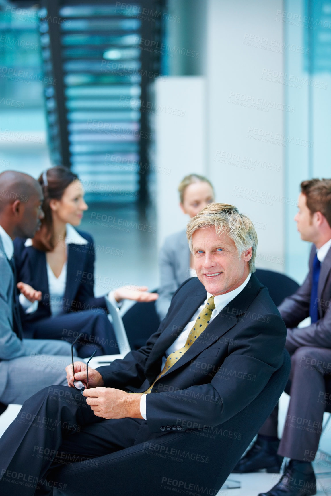 Buy stock photo Proud, meeting and confident businessman with portrait and legal team for court case and people. Mature, smile and happy lawyer in office with attorney and advisor at law firm for feedback review