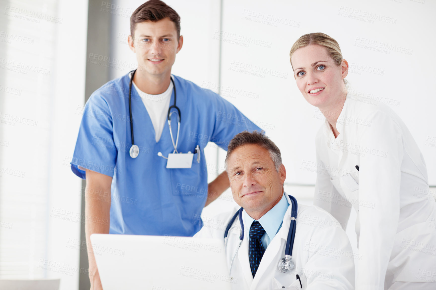 Buy stock photo Group, laptop and portrait with doctors for healthcare results, online feedback or report discussion. Hospital staff, man and woman for medical surgeon, teamwork and collaboration for research