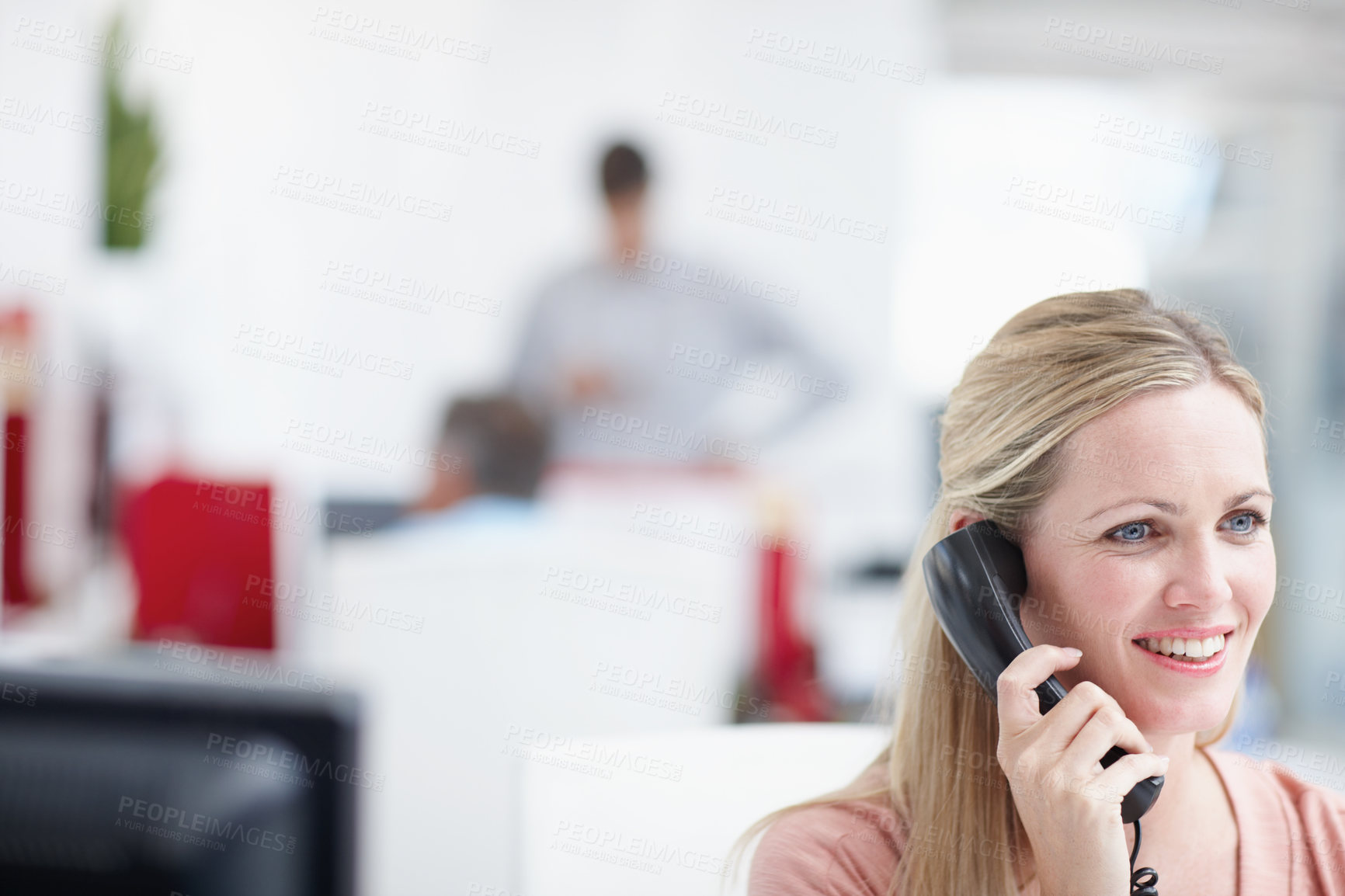 Buy stock photo A female professional having a conversation on the phone alongside an impressive amount of copyspace